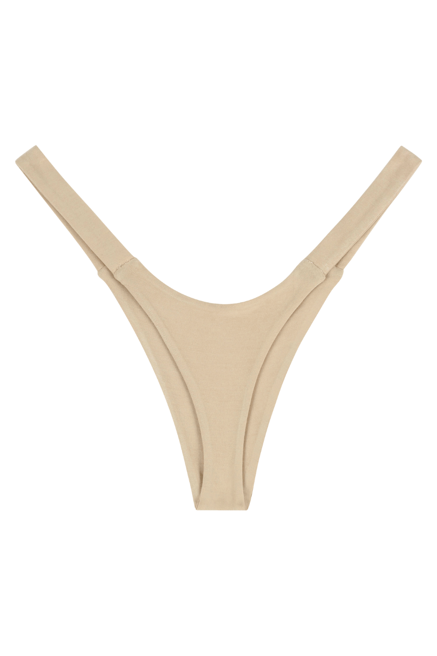 Beige seamless luxury women’s panty thong, back side flat lay product photo.