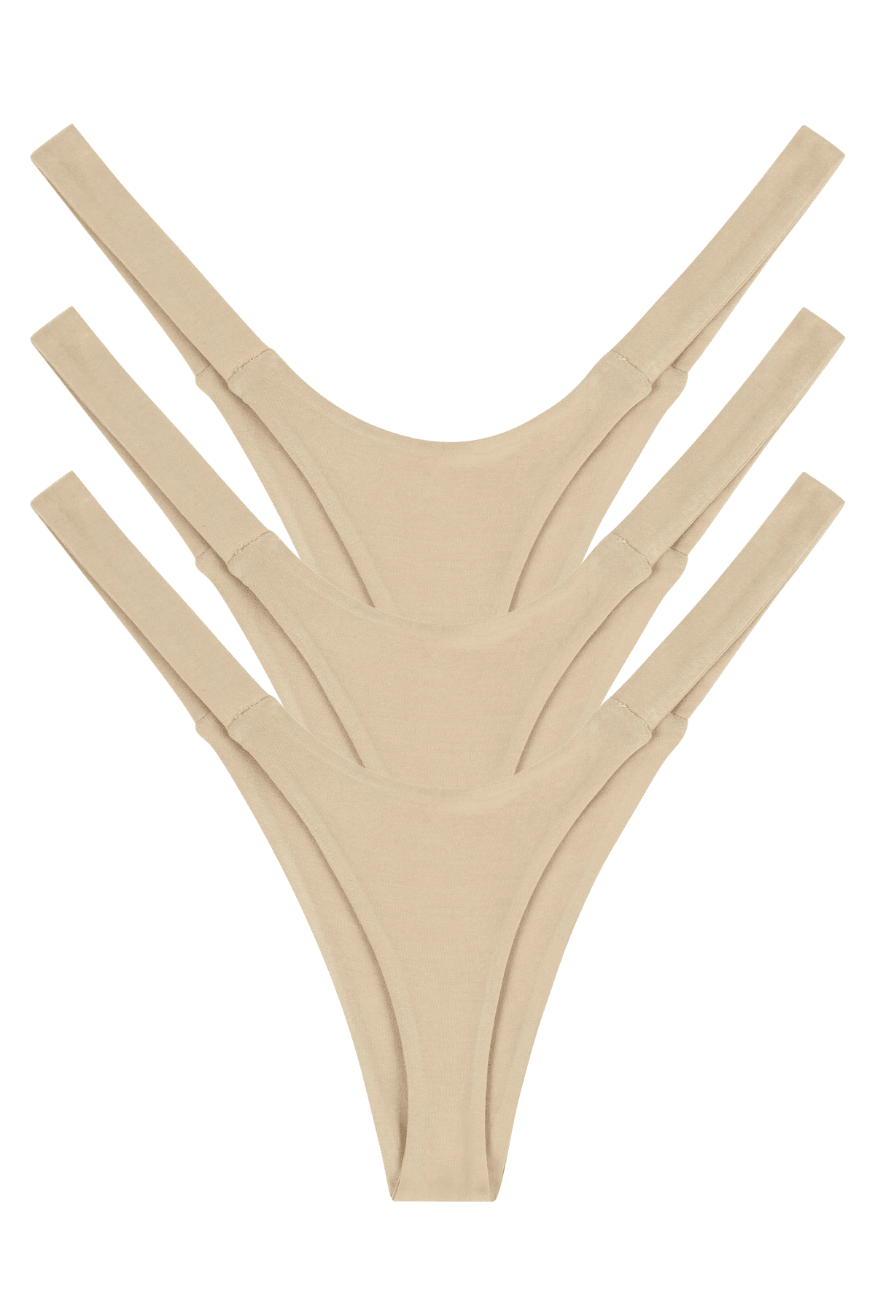 Three beige seamless natural fabric women’s thong panties, multipack back view flat lay
