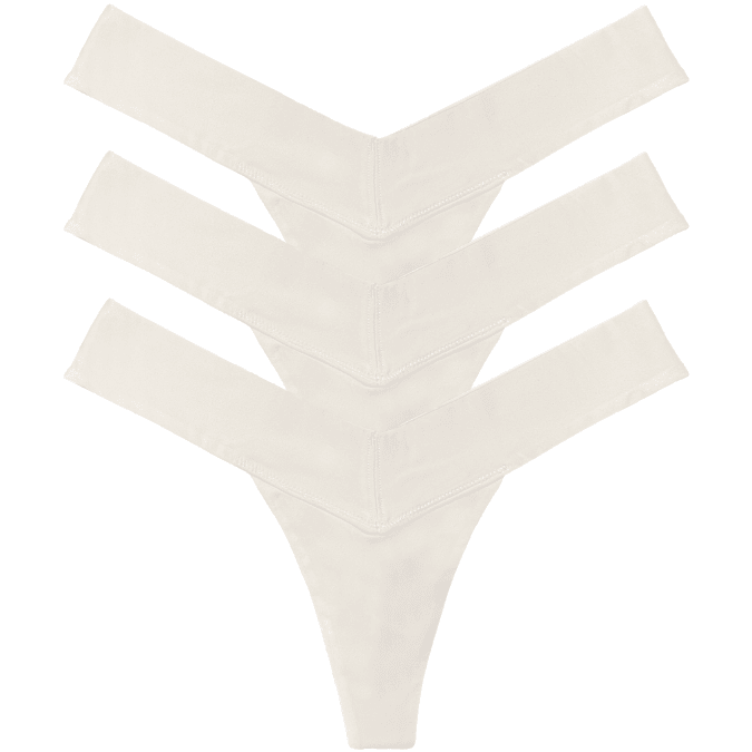 Three white V-shaped Tanboocel™ women’s underwear thongs, multipack flat lay, front view