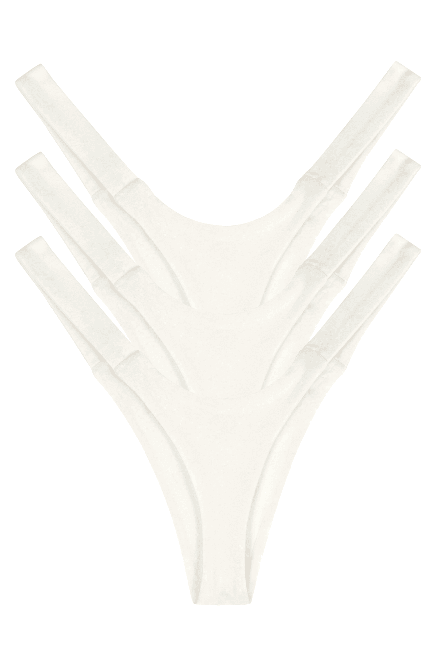 Three white seamless luxury women’s thongs, multipack underwear, back view flat lay