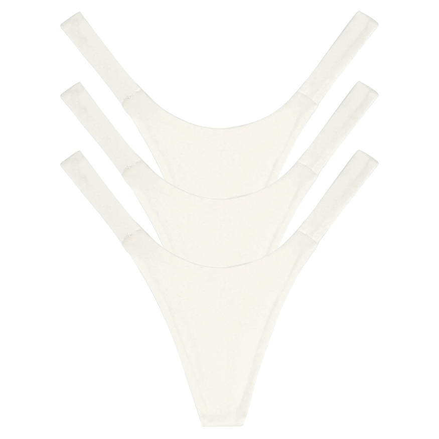 Set of three white bikini bottoms on a white background