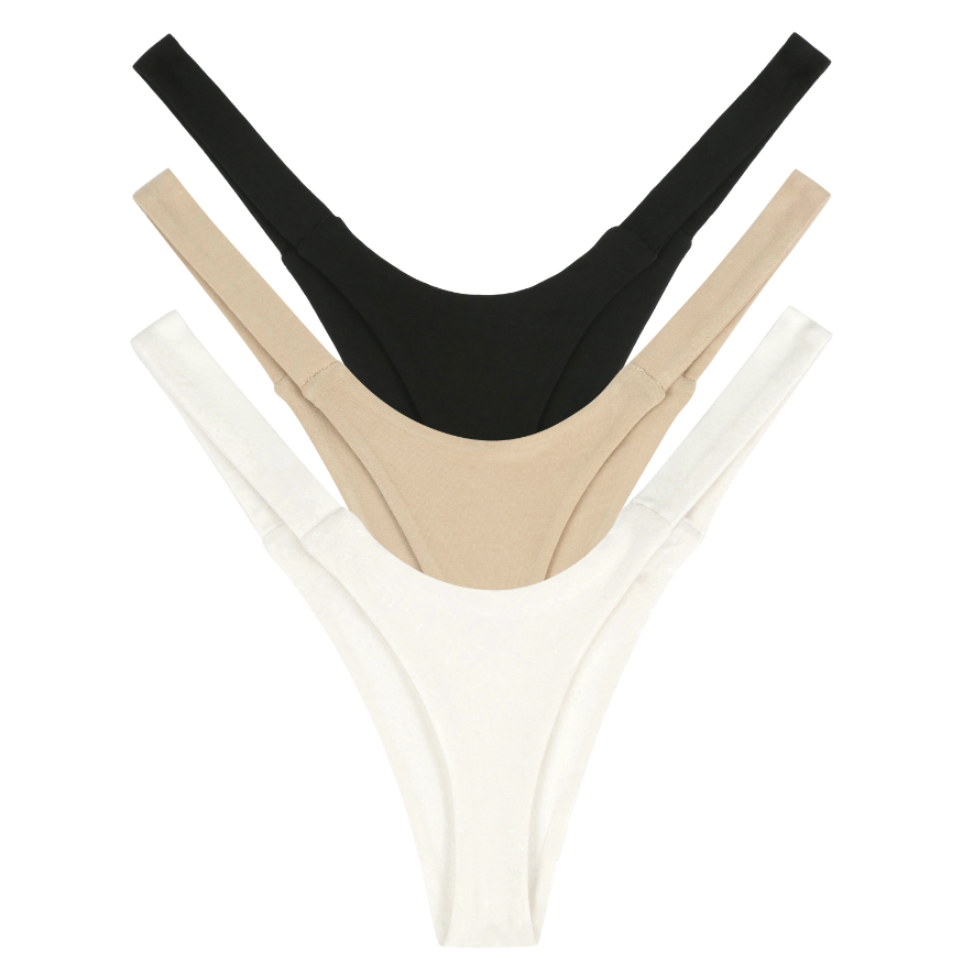 Three pairs of thong underwear in black, beige, and white on a white background